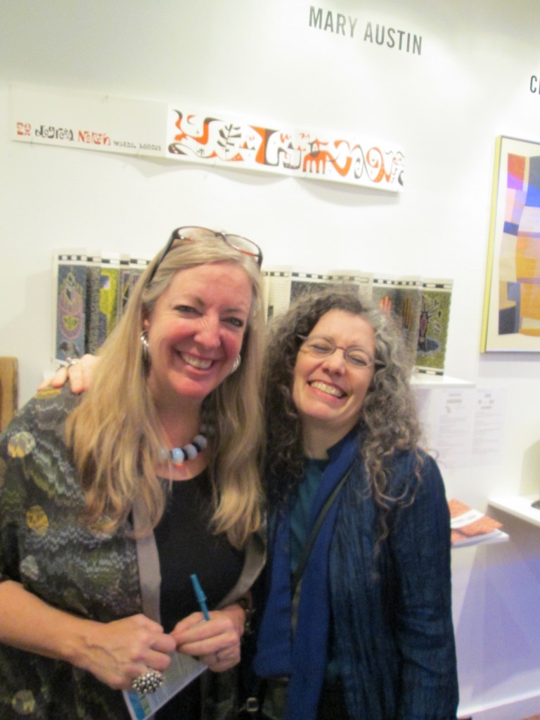 Mary Austin and Robbin Ami Silverberg in front of a selection from Mary's collection